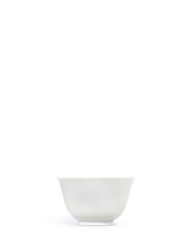 View full screen - View 1 of Lot 3654. A fine white anhua-decorated ‘dragon’ cup, Mark and period of Kangxi | 清康熙 白釉暗刻趕珠龍紋盃 《大清康熙年製》款.
