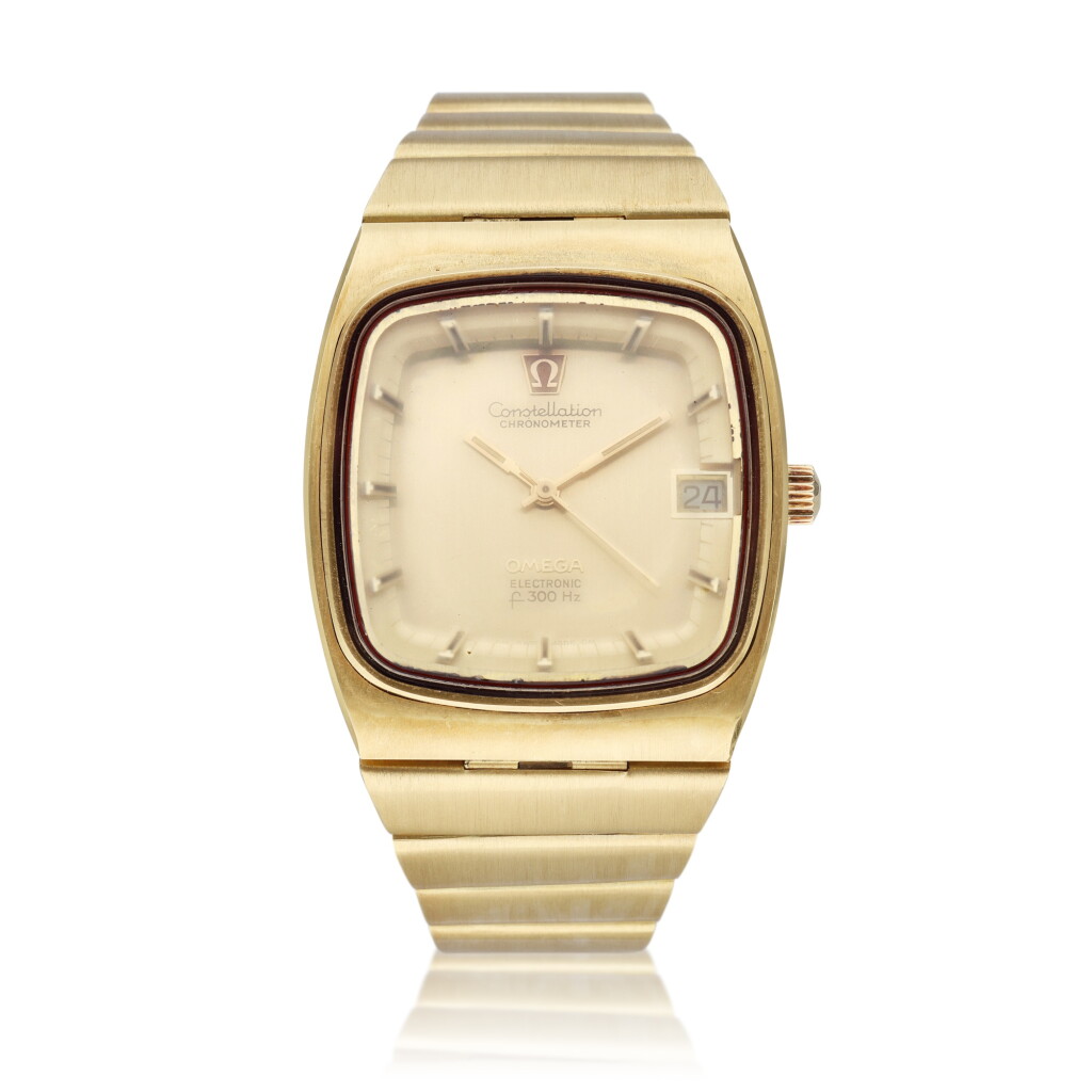 View full screen - View 1 of Lot 449. Reference 198.0048 Megasonic | A yellow gold wristwatch with date and bracelet, Circa 1980.