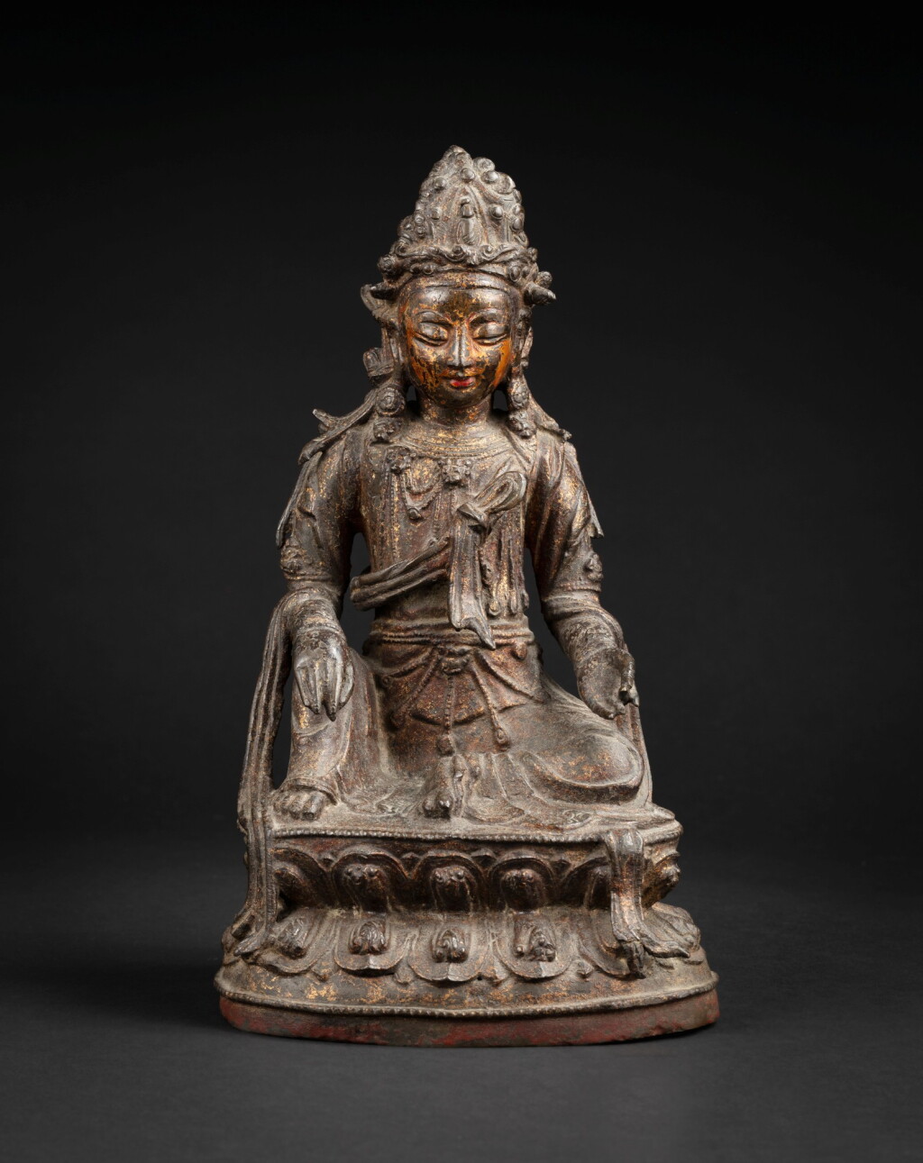 View full screen - View 1 of Lot 193. A lacquered-gilt bronze seated Avalokitesvara Ming dynasty | 明 漆金銅觀世音菩薩坐像.