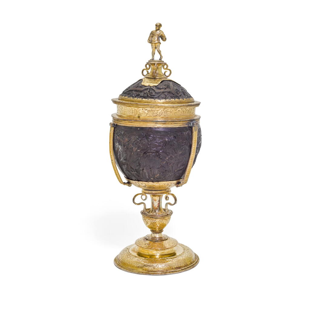 View full screen - View 1 of Lot 5. A German gilt-copper mounted coconut cup and cover, possibly Nuremberg circa 1550.