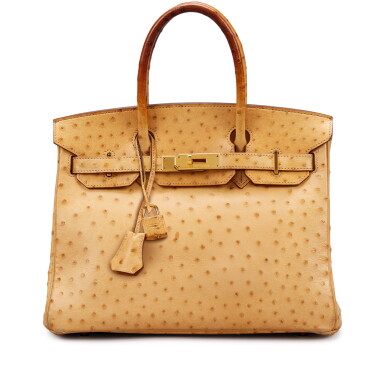 View full screen - View 1 of Lot 128. Saffron Ostrich Birkin 30 Gold Hardware, 2010.