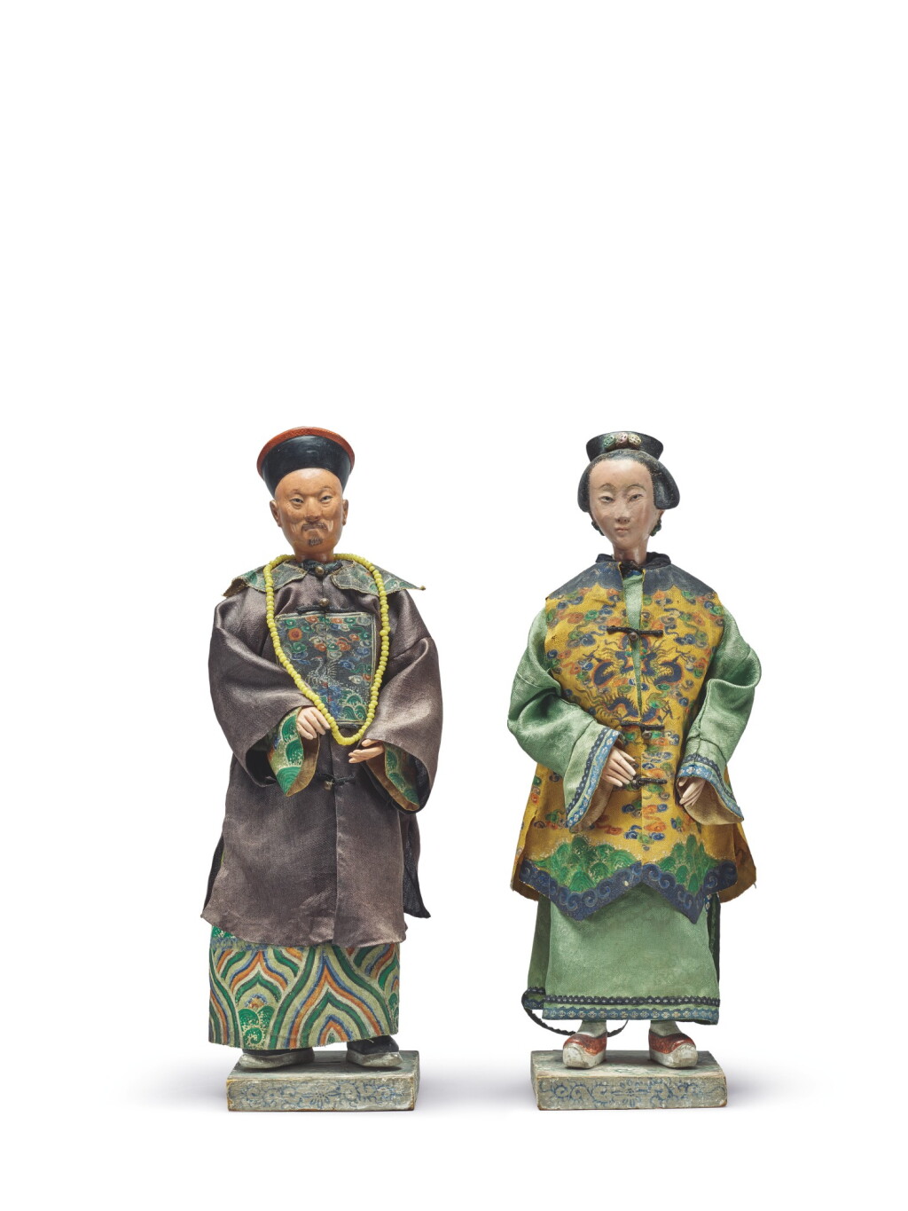 View full screen - View 1 of Lot 1926. A PAIR OF CHINESE PAINTED PLASTER 'NODDING HEAD' FIGURES OF AN OFFICIAL AND LADY, QING DYNASTY, EARLY 19TH CENTURY | 清十九世紀初 彩繪泥塑點頭文官仕女擺件一對.