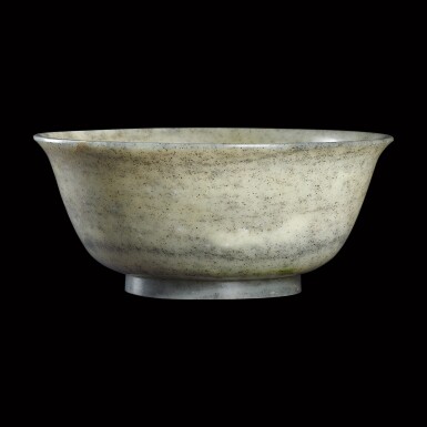 View full screen - View 1 of Lot 37. A rare grey jade imperial bowl Seal mark and period of Qianlong | 清乾隆 御製灰白玉撇口盌 《大清乾隆年製》款.