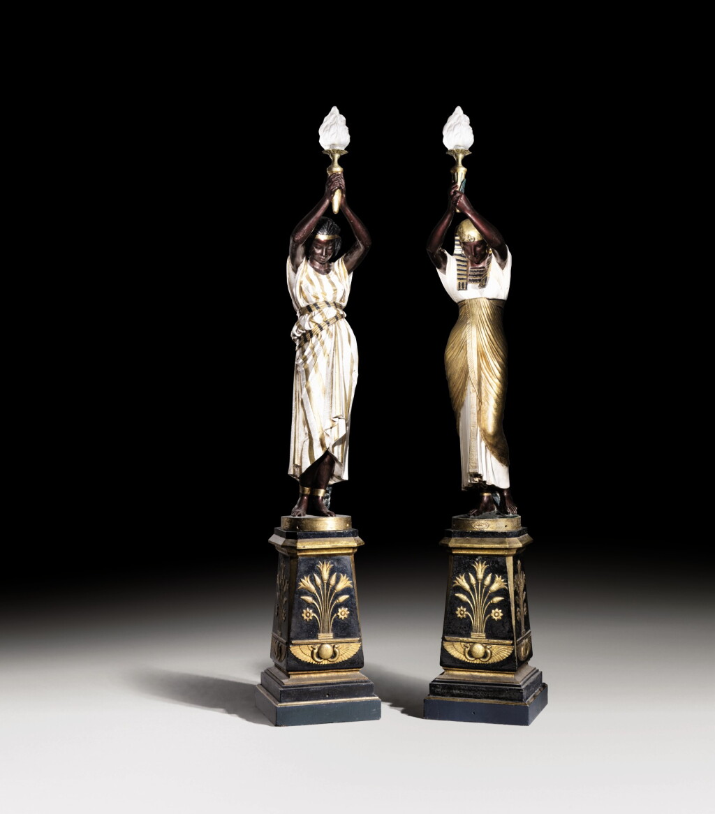 View full screen - View 1 of Lot 228. A PAIR OF FRENCH PARCEL-GILT PAINTED CAST-IRON FIGURAL TORCHERES AFTER MODELS BY MATHURIN MOREAU FROM THE VAL D'OSNE MANUFACTURE, LATE 19TH/EARLY 20TH CENTURY | .