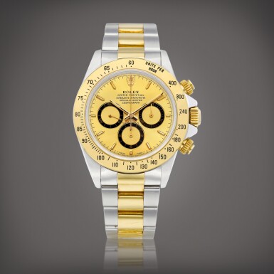 View full screen - View 1 of Lot 875. Cosmograph Daytona, Reference 16523 | A yellow gold and stainless steel chronograph wristwatch with bracelet, Circa 1998 | 勞力士 | Cosmograph Daytona 型號16523 | 黃金及精鋼計時鏈帶腕錶,約1998年製.