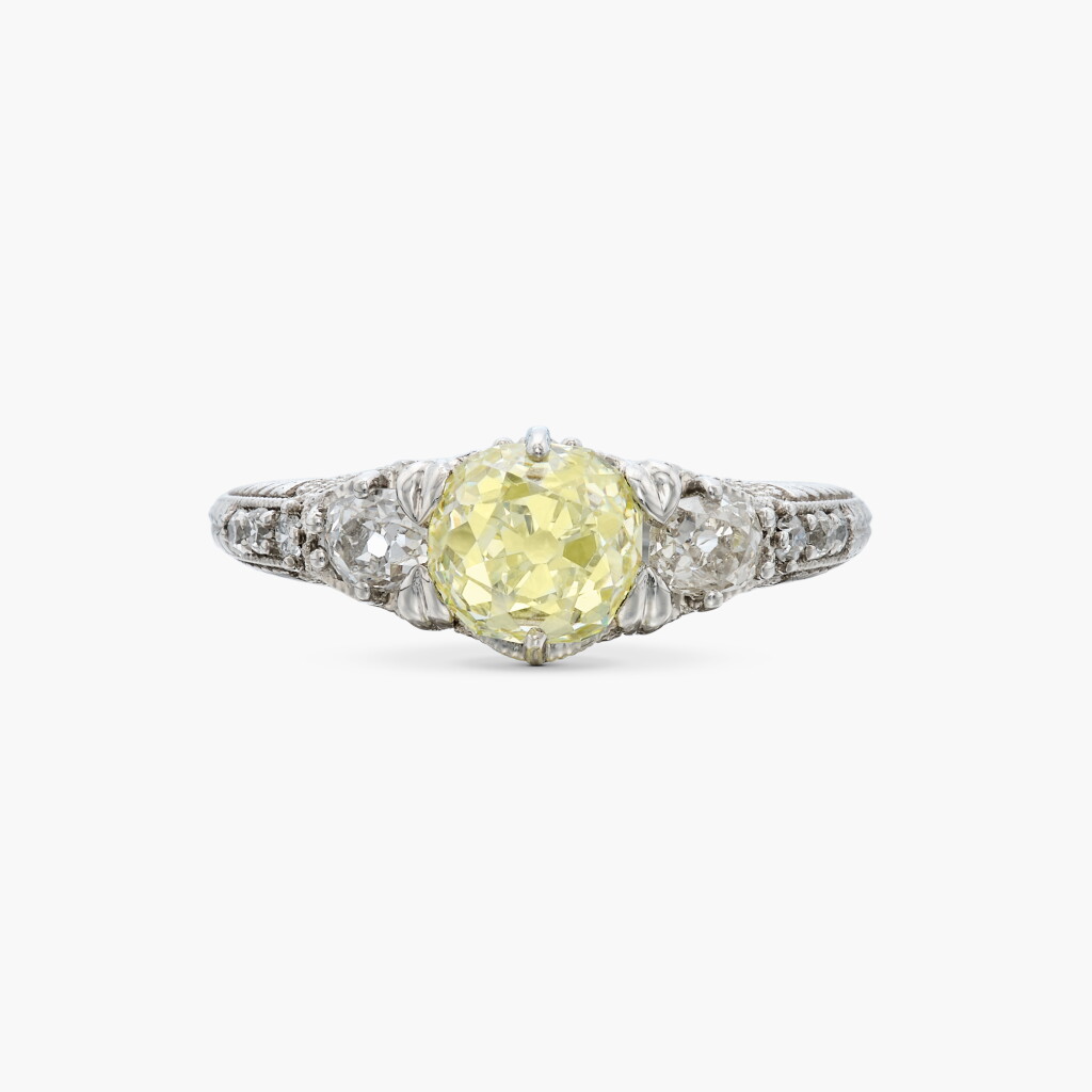 View full screen - View 1 of Lot 310. Fancy Yellow Diamond and Diamond Ring.