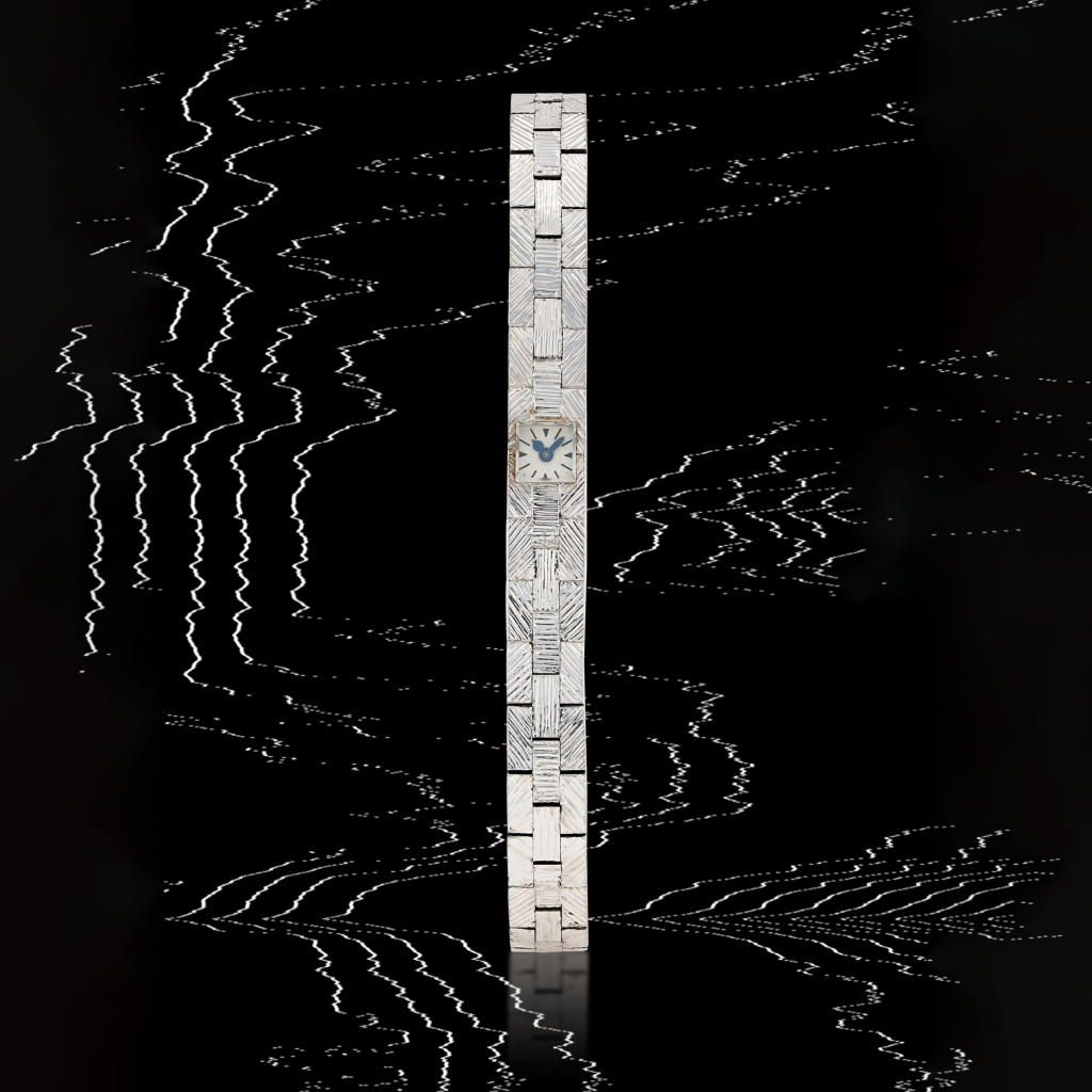 View full screen - View 1 of Lot 5. A white gold bracelet watch | Circa 1965.