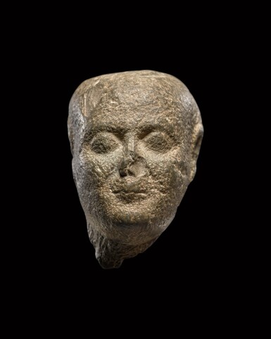 View full screen - View 1 of Lot 141. An Egyptian Basalt Head of a Man, 30th Dynasty/Ptolemaic Period, 380-30 B.C..