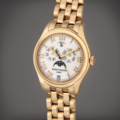 View full screen - View 1 of Lot 220. Reference 5036/1R | A pink gold automatic annual calendar wristwatch with moon phases, bracelet, and power reserve indication, Circa 2005.
