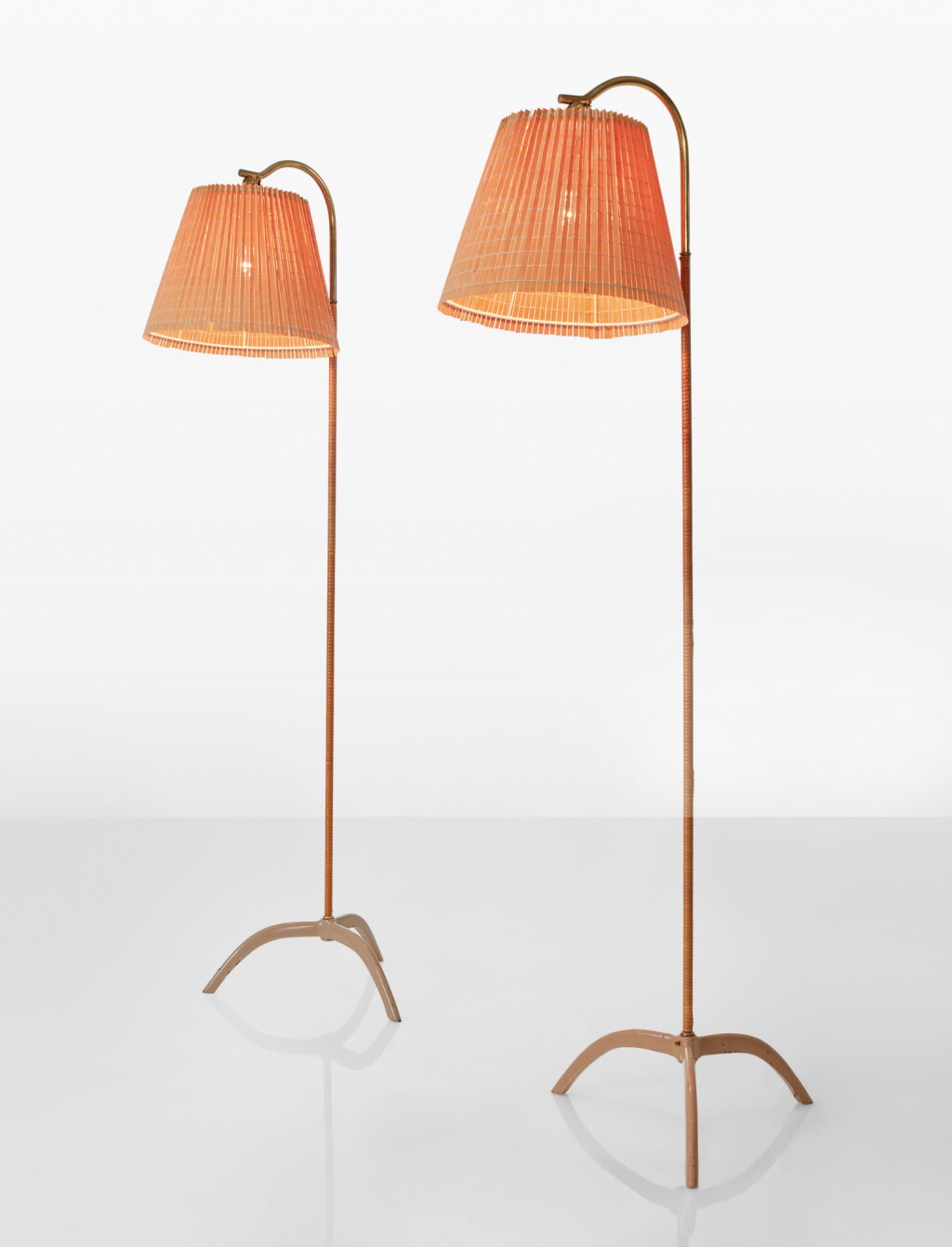 View full screen - View 1 of Lot 98. PAAVO TYNELL | PAIR OF FLOOR LAMPS, MODEL NO. 9609.