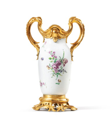 View full screen - View 1 of Lot 220. A gilt-bronze mounted porcelain vase, the porcelain probably England, circa 1760, the mounts Louis XV, circa 1760-1770 | Vase en porcelaine probablement anglaise vers 1760 et monture de bronze doré d'époque Louis XV, vers 1760-1770.