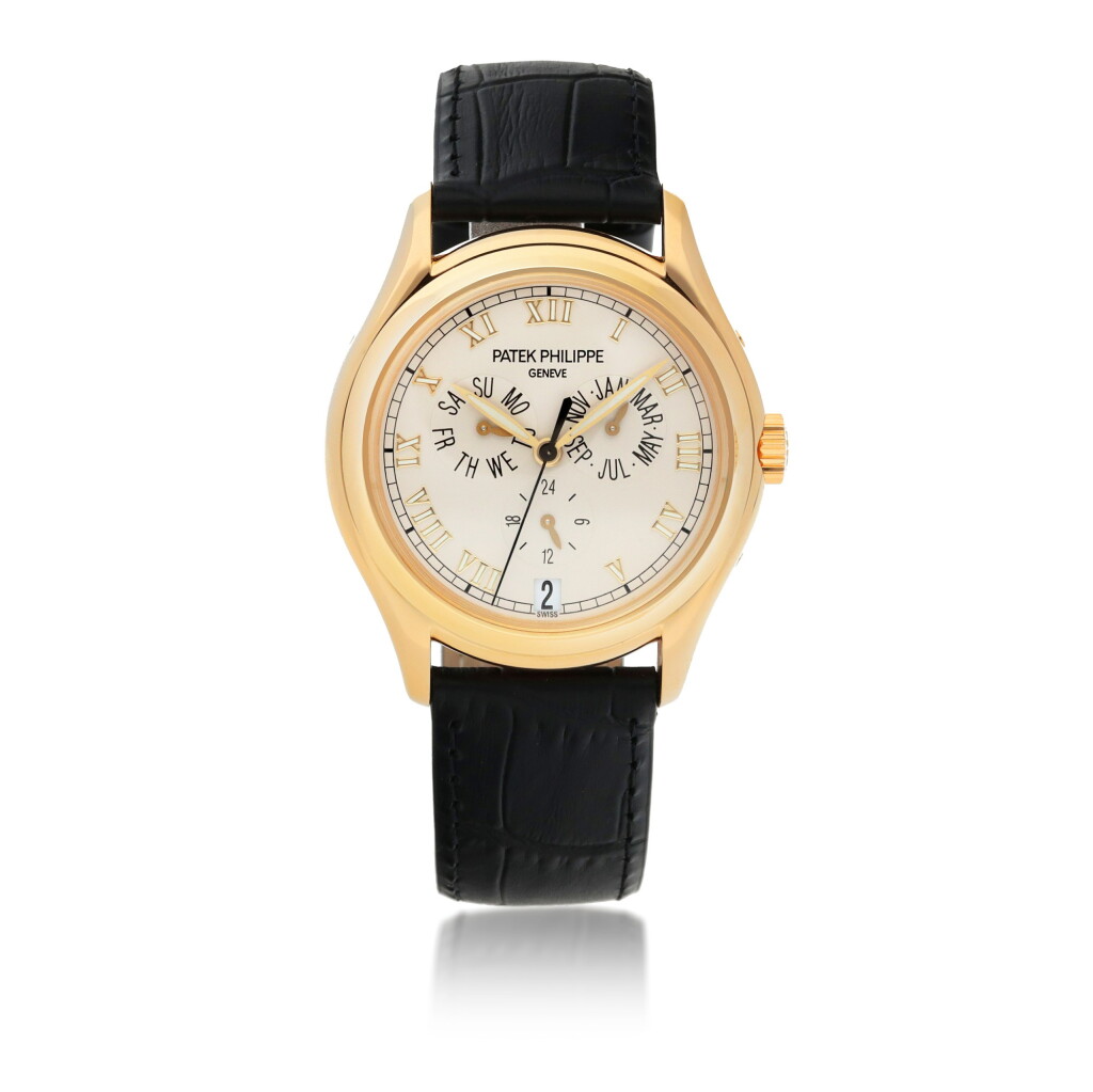 View full screen - View 1 of Lot 559. PATEK PHILIPPE | REF 5035 YELLOW GOLD ANNUAL CALENDAR WRISTWATCH WITH 24-HOUR INDICATION MADE IN 2001.