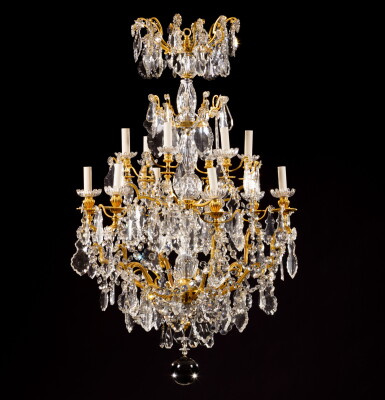 View full screen - View 1 of Lot 76. A large gilt bronze and crystal chandelier, signed by Baccarat, Louis XVI style, circa 1880-1890 | Baccarat, grand lustre en bronze doré et cristal, de la manufacture de Baccarat, de style Louis XVI, vers 1880-1890.