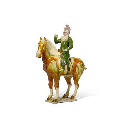 View full screen - View 1 of Lot 173. A sancai-glazed figure of an equestrian, Tang dynasty | 唐 三彩騎馬俑.