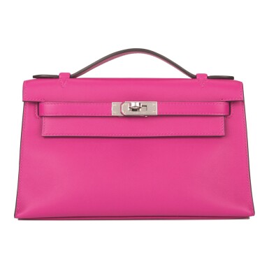View full screen - View 1 of Lot 16. Hermès Rose Pourpre Mini Kelly Pochette of Swift Leather with Palladium Hardware.