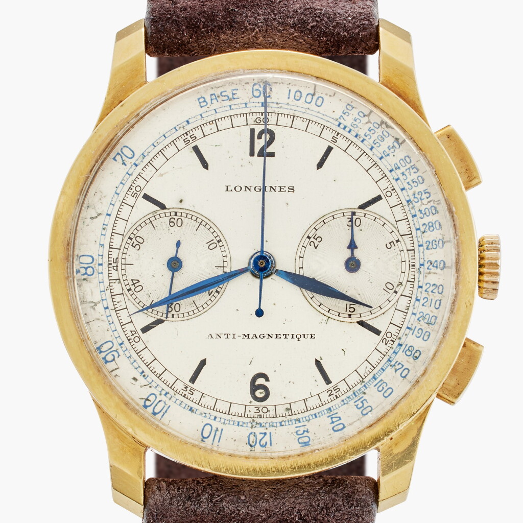 View full screen - View 1 of Lot 602. A yellow gold chronograph wristwatch with two-tone dial, Circa 1941.