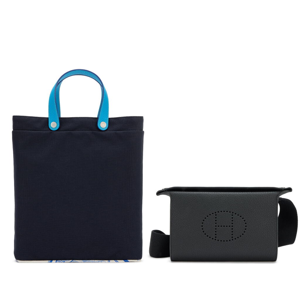 View full screen - View 1 of Lot 212. Set of Two Black Togo Videopoches Palladium Hardware, 2023 and Navy Canvas, Bleu Hydra Togo and Silk Petit H Tote Bag Palladium Hardware.