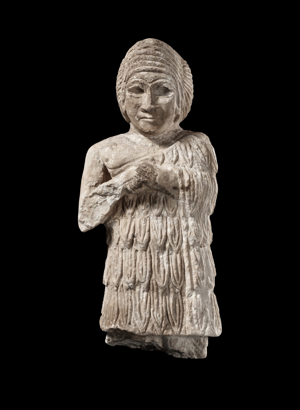 View full screen - View 1 of Lot 452. A Sumerian Limestone Figure of a Female Worshipper, Early Dynastic, 3rd Millennium B.C..