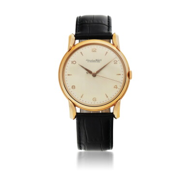 View full screen - View 1 of Lot 411. IWC | PINK GOLD WRISTWATCH WITH ARCHITECTURAL LUGS, CIRCA 1955.