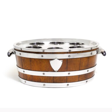 View full screen - View 1 of Lot 97. AN ENGLISH ELECTROPLATE AND COOPERED OAK TABLE OR BAR WINE COOLER, FIRST QUARTER 20TH CENTURY.