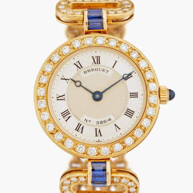 View full screen - View 1 of Lot 524. Reference 8251 BA | A yellow gold, diamond and sapphire-set bracelet watch, Circa 1998.