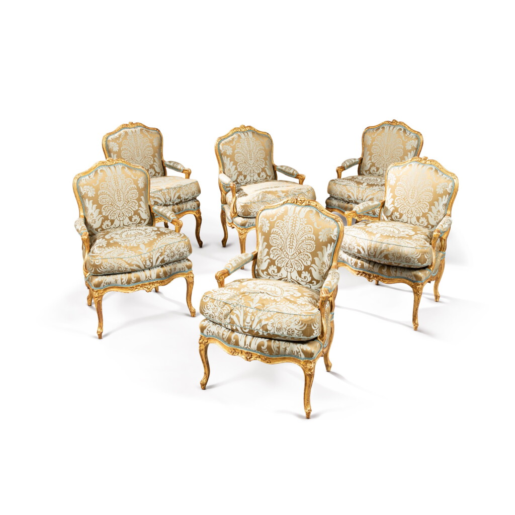 View full screen - View 1 of Lot 135. A suite of six Louis XV giltwood armchairs, circa 1750, stamped by Jacques Desestre | Suite de six fauteuils en bois doré d'époque Louis XV, vers 1750, estampille de Jacques Desestre.