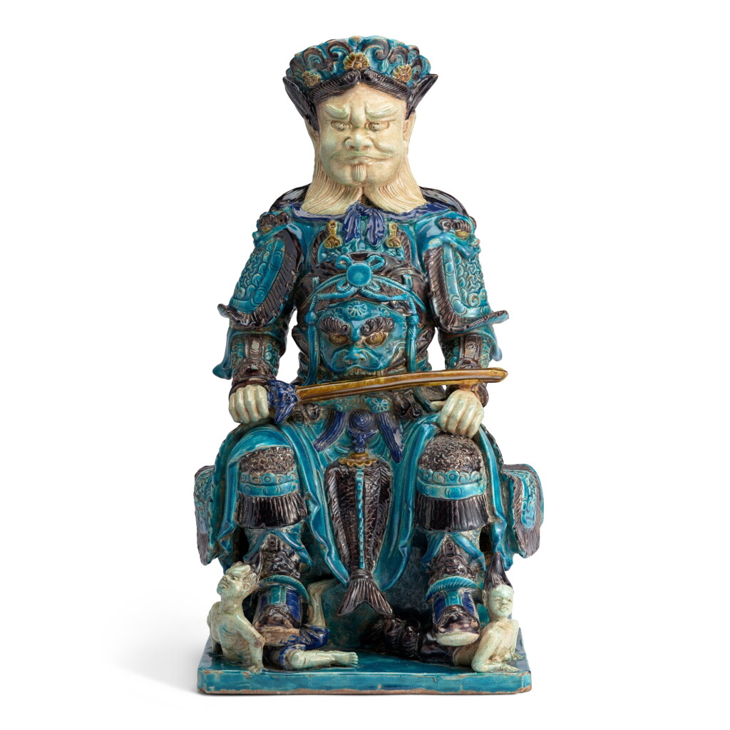 View full screen - View 1 of Lot 129. A rare fahua-glazed figure of a Guardian.
