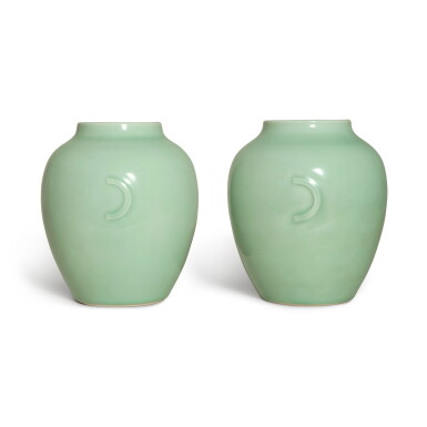 View full screen - View 1 of Lot 1106. A pair of celadon-glazed ovoid jars, Seal marks and period of Qianlong | 清乾隆 粉青釉月牙耳罐一對 《大清乾隆年製》款.