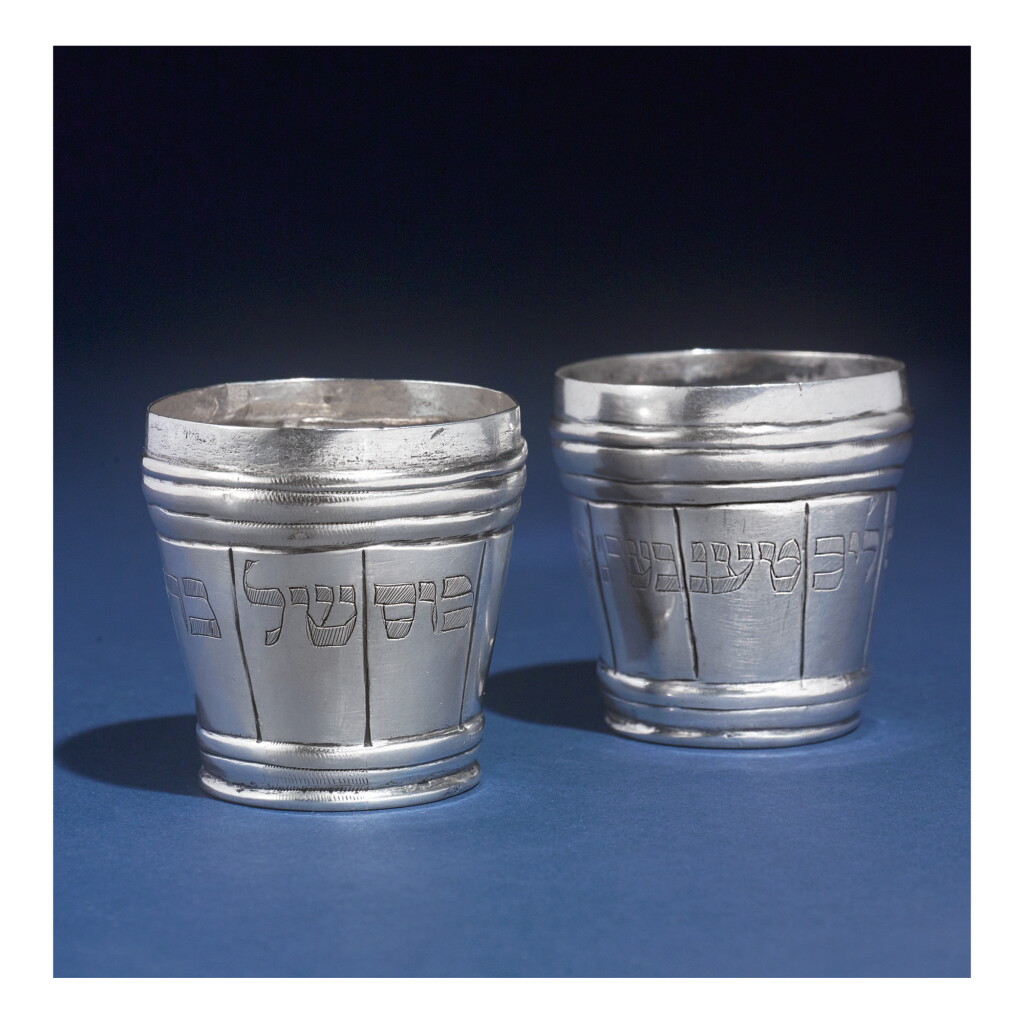 View full screen - View 1 of Lot 118. A SILVER DOUBLE BEAKER FOR CIRCUMCISION, MAKER'S MARK DHE, TOWN MARK A SLIPPED TREFOIL, GERMAN OR AUSTRIAN, CIRCA 1800.