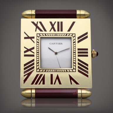View full screen - View 1 of Lot 57. A brass and lacquer rectangular desk timepiece with alarm, Circa 1995.