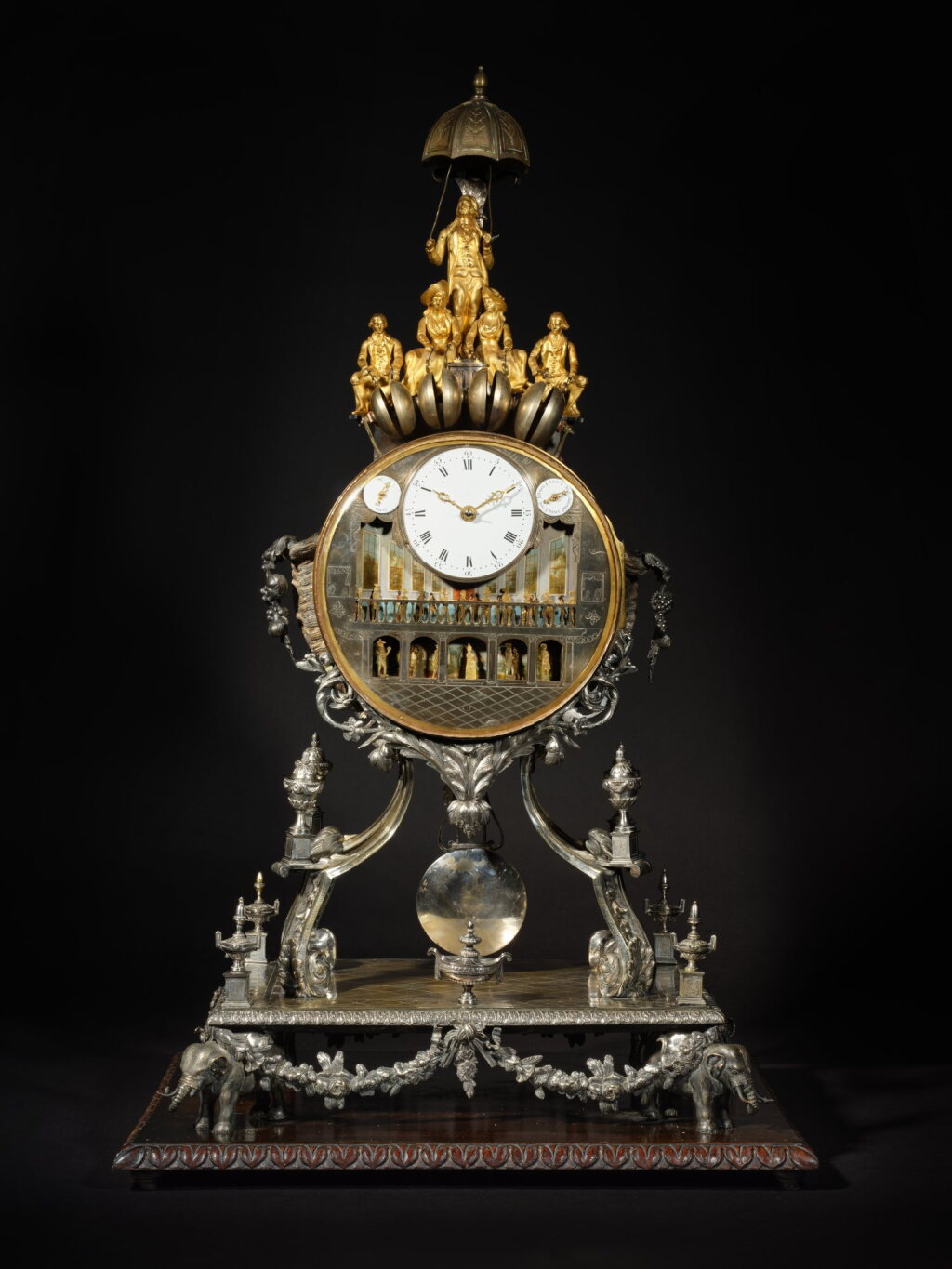View full screen - View 1 of Lot 18. A George III Silvered and Gilt Bronze and Silvered Metal Quarter-Striking Musical Automaton Clock, William Carpenter, London, made for the Chinese Market, dated 1780 .