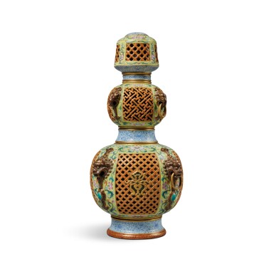 View full screen - View 1 of Lot 269. An extremely rare 'yangcai' reticulated revolving vase, Seal mark and period of Qianlong |清乾隆 黃地洋彩描金蓮紋鏤空壽字紋如意獸耳轉心瓶 《大清乾隆年製》款.
