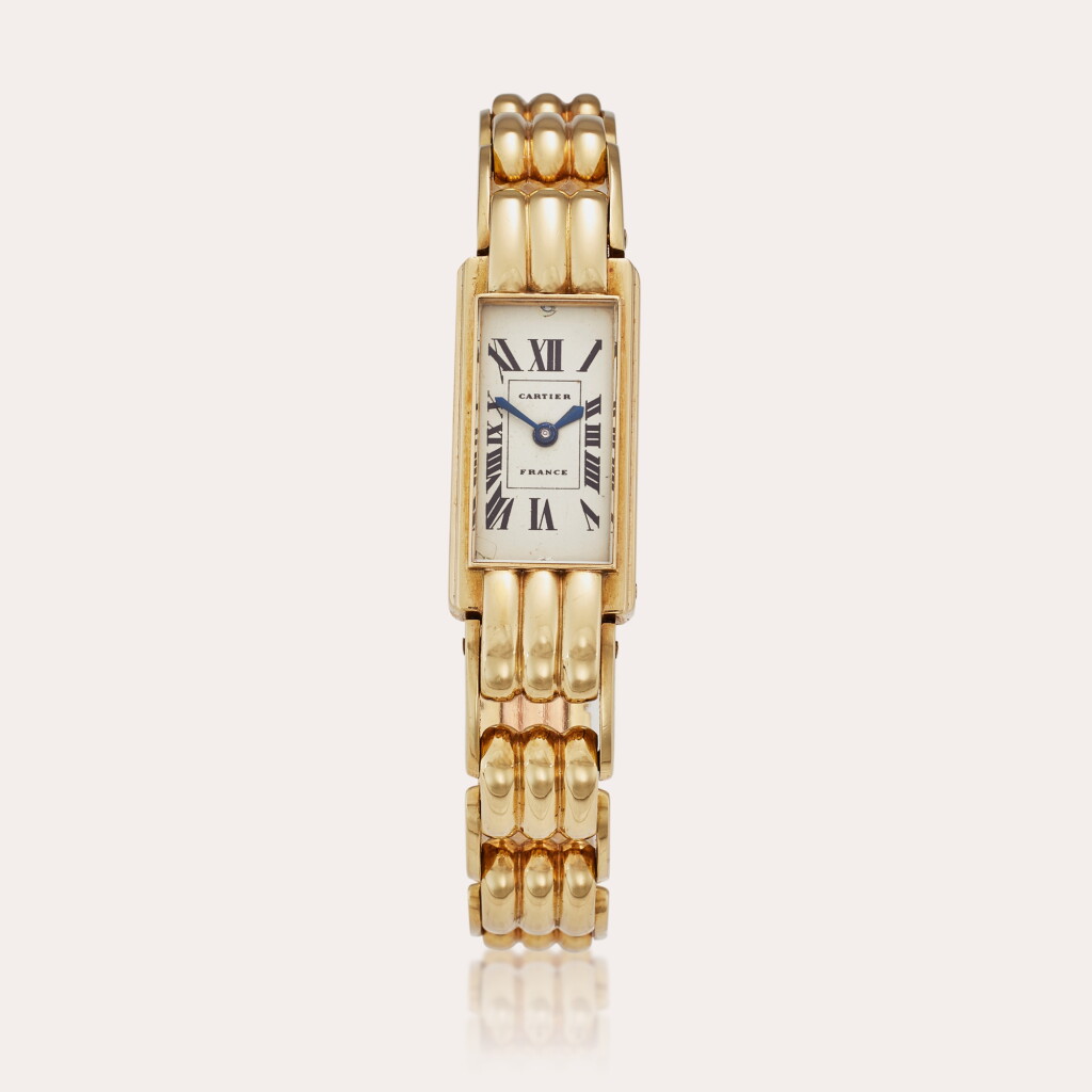 View full screen - View 1 of Lot 73. A yellow gold bracelet watch with France dial, Circa 1934 and Owned by Buffy Birrittella.