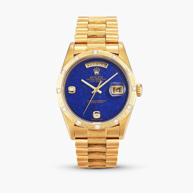 View full screen - View 1 of Lot 2332. Day-Date, Reference 18248 | A yellow gold and diamond-set wristwatch with day, date, lapis lazuli dial and bracelet, Circa 1998.