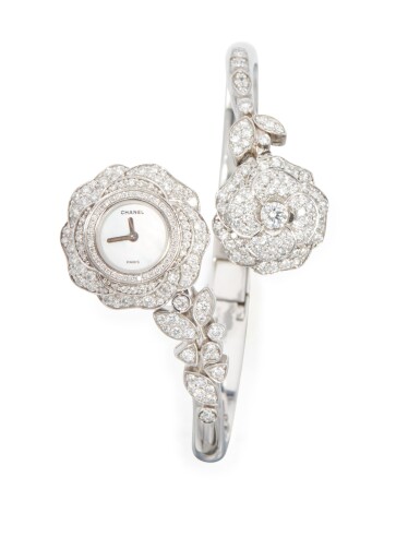 View full screen - View 1 of Lot 39. DIAMOND AND MOTHER-OF-PEARL 'CAMELLIA' BRACELET-WATCH, CHANEL, FRANCE.