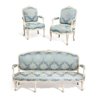 View full screen - View 1 of Lot 680. A PAIR OF LOUIS XV IVORY-PAINTED FAUTEUILS À LA REINE WITH A CANAPÉ EN SUITE BY NADAL, CIRCA 1760.
