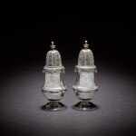 Royal: A pair of George I Britannia standard silver casters, Pierre Platel, London, 1717