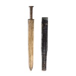 A parcel-gilt bronze sword and black lacquer scabbard, Han dynasty 漢 局部鎏金銅短劍及黑漆鞘
