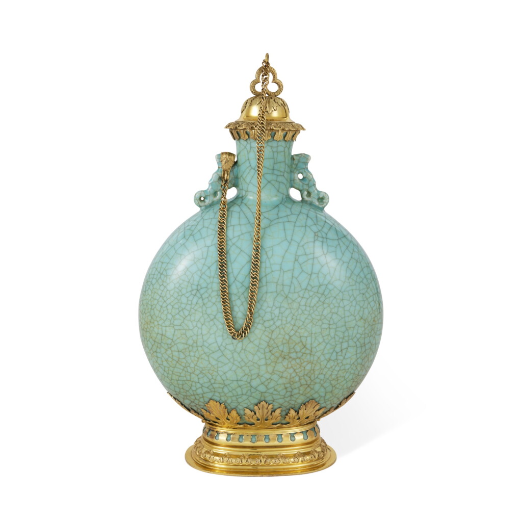 View full screen - View 1 of Lot 26. A Chinese Celadon-Glazed Porcelain Ge-Type Moon Flask With George IV Silver-Gilt Mounts, The Porcelain Qing Dynasty, Qianlong Period; The Mounts William Ellott, London, 1827, Probably Retailed By Thomas Hamlet.