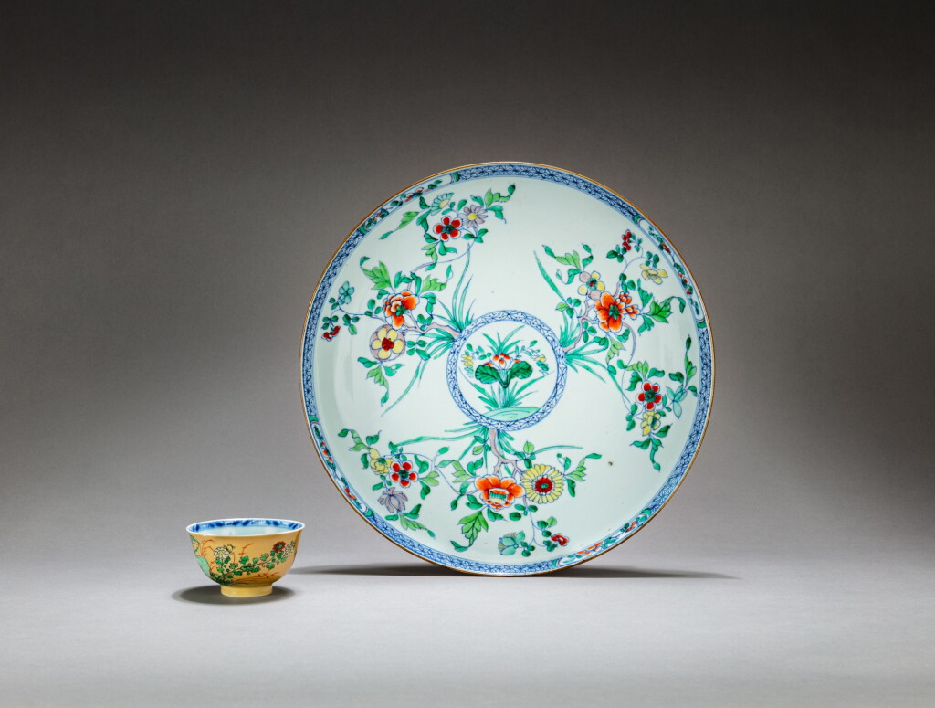View full screen - View 1 of Lot 177. A doucai dish and a café-au-lait ground famille verte cup Qing dynasty, Kangxi period | 清康熙 鬪彩花卉紋盤及米黃地五彩小盃 一組兩件.