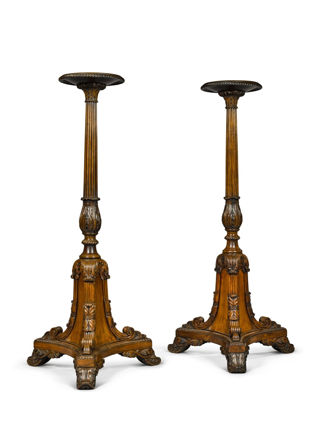 View full screen - View 1 of Lot 139. A pair of George IV carved mahogany torchères, second quarter 19th century, in the manner of Gillows.