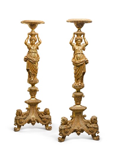 View full screen - View 1 of Lot 30. A pair of George II carved giltwood torchères, second quarter 18th century, after a design by Alexis Loir.