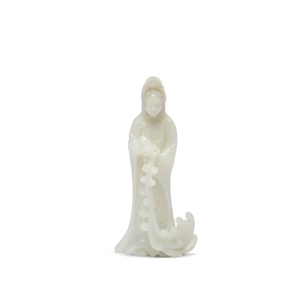 View full screen - View 1 of Lot 133. A pale celadon jade standing figure of Guanyin, 19th / 20th century.