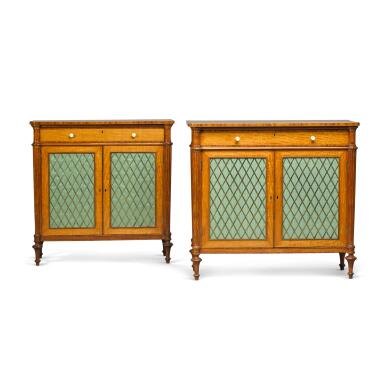 View full screen - View 1 of Lot 92. A pair of George III satinwood and tulipwood crossbanded side cabinets, circa 1800, in the manner of Holland & Sons.