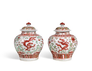 View full screen - View 1 of Lot 2038. A pair of wucai 'dragon' jars and covers, Marks and period of Jiajing | 明嘉靖 五彩龍紋蓋罐一對 《嘉靖年造》款.