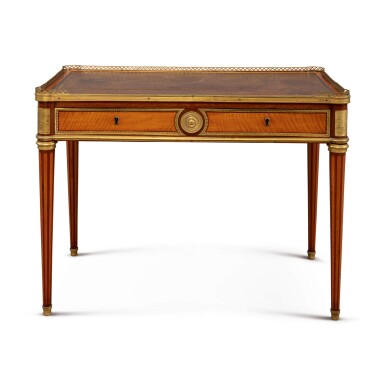 View full screen - View 1 of Lot 669. A SMALL LOUIS XVI GILT BRONZE-MOUNTED CITRONNIER AND AMARANTH BUREAU PLAT BY GODEFROY DESTER, LAST QUARTER 18TH CENTURY.