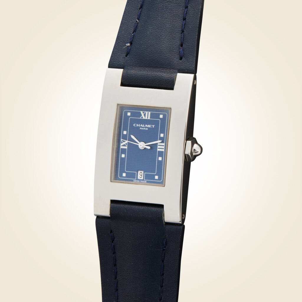 View full screen - View 1 of Lot 303. Reference 22 T 1631 | A stainless steel rectangular wristwatch with date, Circa 1997.