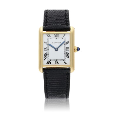 View full screen - View 1 of Lot 409. Tank Louis | A yellow gold wristwatch, Circa 1972.