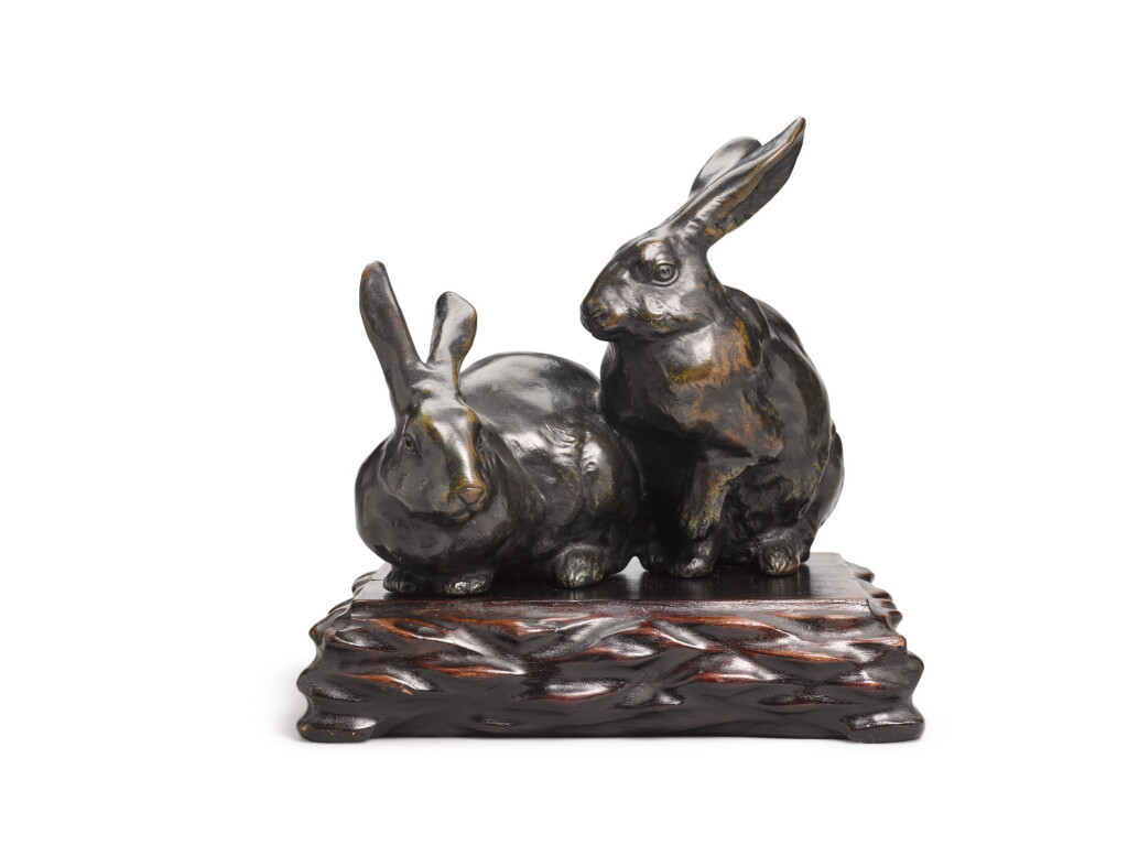 View full screen - View 1 of Lot 8. A Japanese bronze model of two hares, Meiji period, late 19th century.