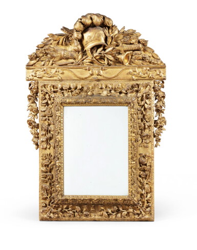 View full screen - View 1 of Lot 204. A regence style giltwood mirror.